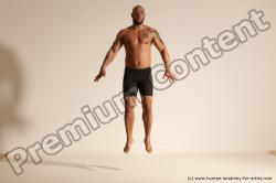 Underwear Gymnastic poses Man Black Muscular Bald Dancing Dynamic poses Academic